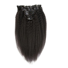 Set of black hair extensions with clips on a white background